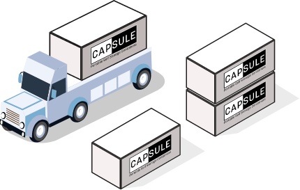 CAPSULE truck next to several CAPSULE containers